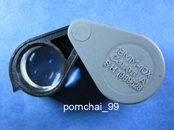  กล้องส่องพระ Canon 10 x 18 mm. เลนซ์แก้ว 3 ชั้นเคลือบมัลติโค๊ทlสีฟ้าเป็นกล้องสต๊อกเก่าก้านดำขอบขาวพ