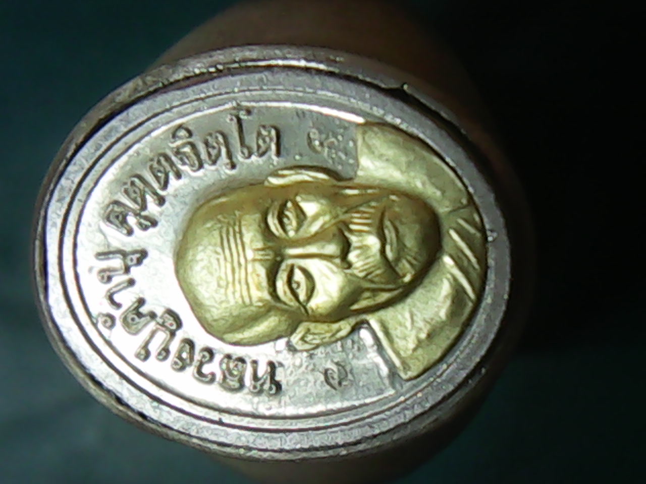 เหรียญเม็ดแตงหัวแหวนนวะแก่เงินหน้ากากทอง หลวงปู่คำบุ วัดกุดชมภู