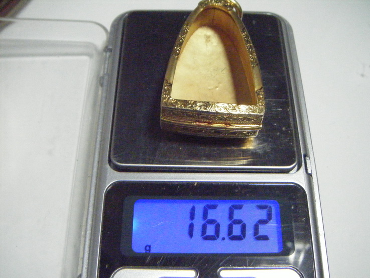 ตลับทองเก่าใส่พระกริ่งหรือหลวงพ่อทวดเตารีดหนัก16.62กรัม