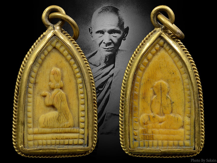 พระปิดตาหลังนางกวักงาแกะ หลวงพ่อเดิม วัดหนองโพ