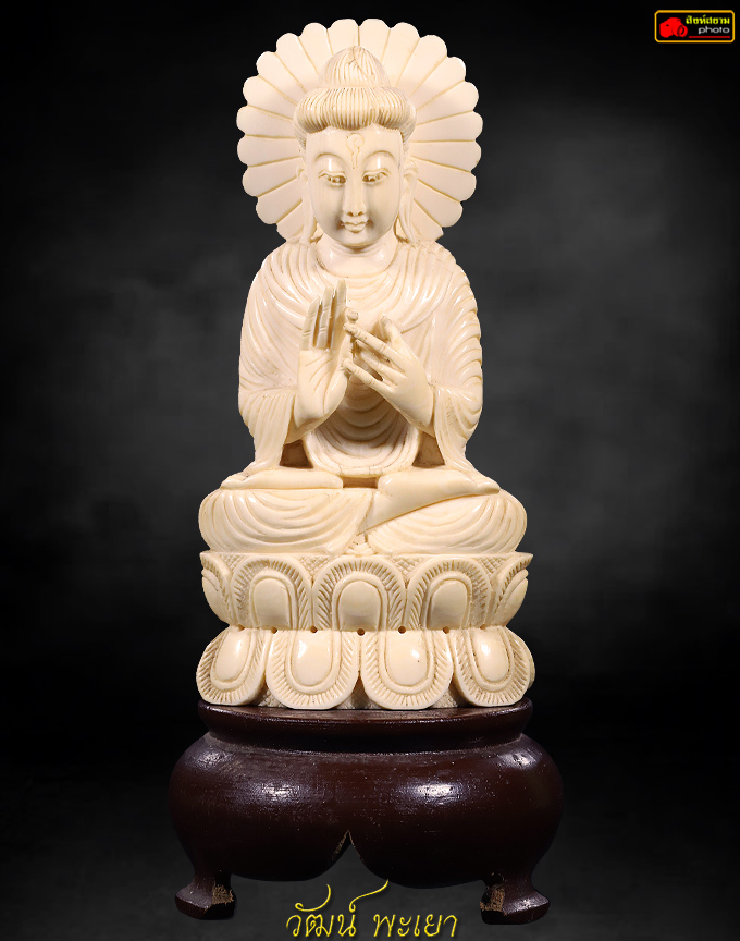 พระพุทธรูปJาช้างแกะสลักมีรัศมี 