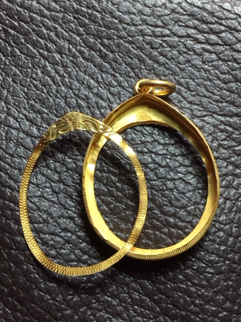 กรอบทองใส่เหรียญไข่