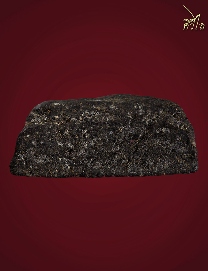 พระเกศาครูบาเจ้าศรีวิชัยเป็นพระพิมพ์นางพญาข้างหลังปั๊ม 2500 